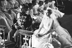 Prince Rainier of Monaco and American actress Grace Kelly (1929 - 1982) sit before the altar during their wedding ceremony at the Cathedral of Saint Nicholas, Monte Carlo, Monaco, April 19, 1956. Kelly's gown was designed by costume designer Helen Rose. (Photo by Thomas McAvoy/The LIFE Picture Collection/Getty Images)