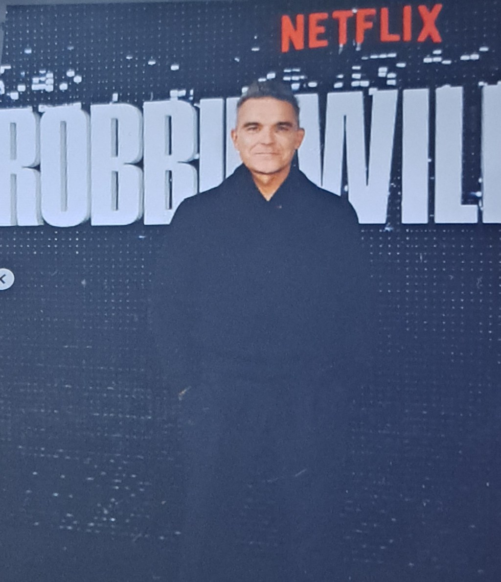 CULTURE. MUSIC WORLD. NEWS MUSIC Dokument, Series…World Famous, Popular&Successful MUSIC ARTIST, Singer …ROBBIE WILLIAMS. NetFlix STREAMING Service.                   1. SEASON/Kausi, 4 Period/Jaksoa.           1 and 4 Period..CONCERT Live  KNEBWORTH. Music Albums, Hits, Singles and Music Videos….Start TAKE THAT and Popular, Successful  SOLO Artist. FAVOURITE… 15 +20 Likes. My Favourite, New info…               7 –  8.1.2023. BLOG Back again…  LIFESTYLEBLOG HXSTYLE.net&nbsp;Heini